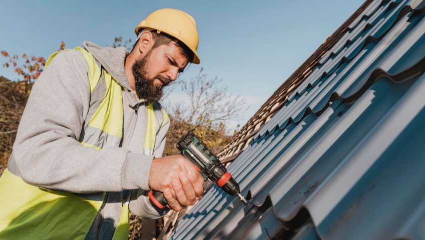 exterior contractor performing a roof repair